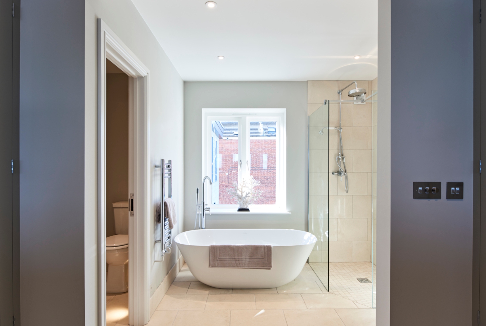 Freestanding bath in grey bathroom - Interior design - Claire Garner ...